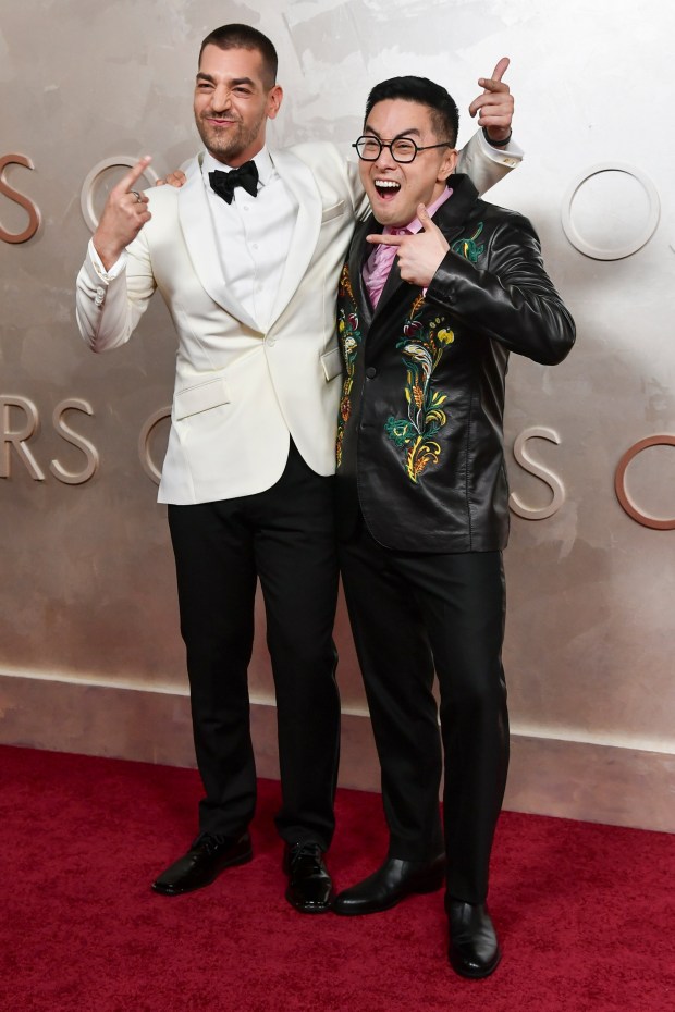 Bowen Yang and Matt Rogers arrive at the Oscars 