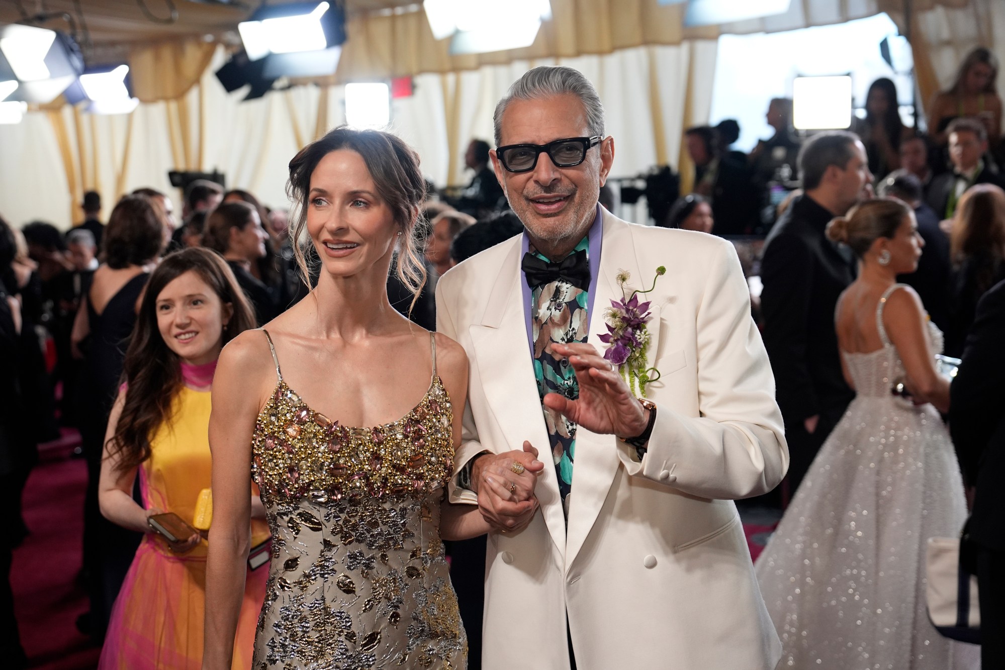 Emilie Livingston, left, and Jeff Goldblum arrive at the Oscars on Sunday, March 2, 2025, at the Dolby Theatre in Los Angeles. (AP Photo/John Locher)
