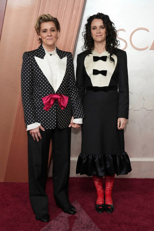 Brandi Carlile and Catherine Shepherd arrive at the Oscars