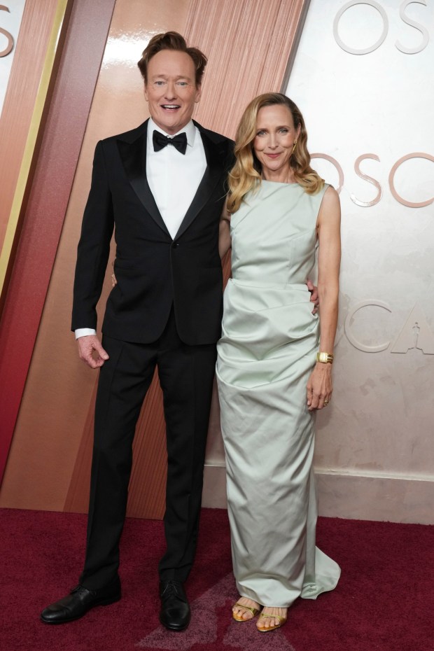 Conan O'Brien and Liza Powel O'Brien arrive at the Oscars