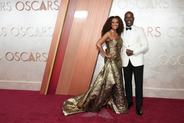 Ryan Michelle Bathe and Sterling K. Brown arrive at the Oscars