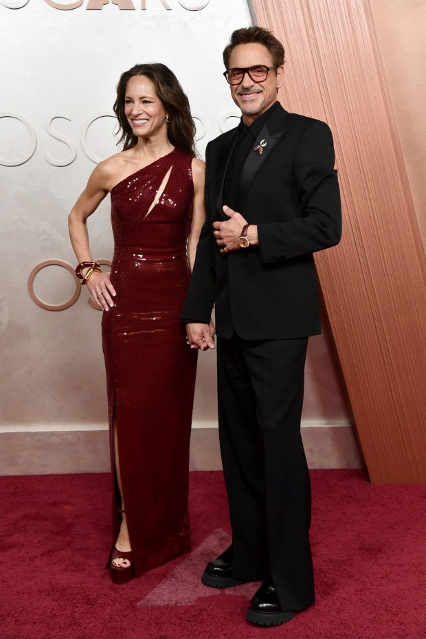 Susan Downey and Robert Downey Jr. arrive at the Oscars