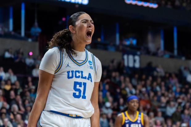 UCLA center Lauren Betts (51) reacts during the first half of a game against LSU in the Elite Eight of the NCAA college basketball tournament, Sunday, March 30, 2025, in Spokane, Wash. (AP Photo/Jenny Kane)