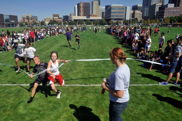 Almost 700 HOPE Online Learning Academy Co-Op students from across Colorado attended a field day event at CU Denver Field at the Auraria Campus on Friday afternoon, Sept. 19, 2014. (Photo by Patrick Traylor/The Denver Post)