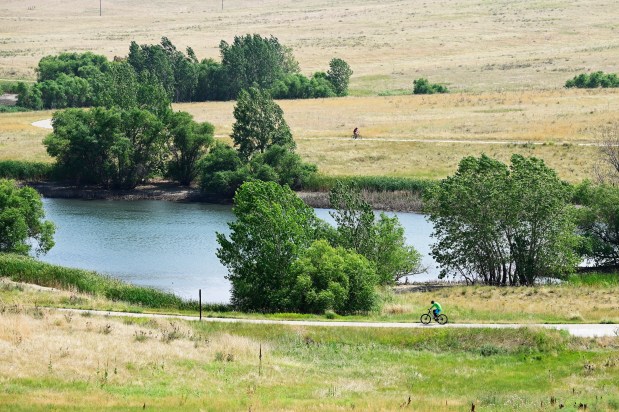 Cyclists ride near the southern end of Aurora Reservoir in Aurora on Thursday, July 25, 2024. (Photo by Hyoung Chang/The Denver Post)