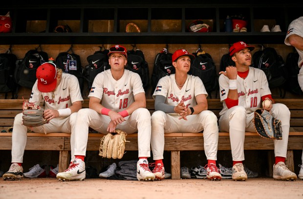 Diesel Bernosky (1), Gavin Cronin (18), Hudson Alpert (15) and Deion Cesario-Scott (10) of the Regis Jesuit Raiders prepare to take the field agianst the Legend Titans during the Raiders' 6-2 win at Regis Jesuit High School in Aurora, Colorado on Wednesday, April 16, 2025. (Photo by AAron Ontiveroz/The Denver Post)