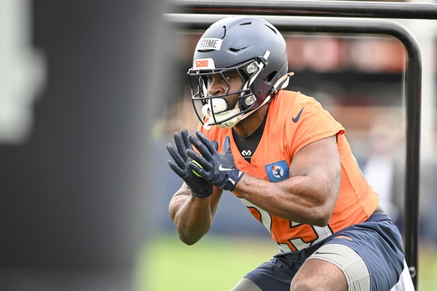 Audric Estime (23) of the Denver Broncos works out during OTAs at Broncos Park in Englewood, Colorado on Thursday, May 29, 2024. (Photo by AAron Ontiveroz/The Denver Post)