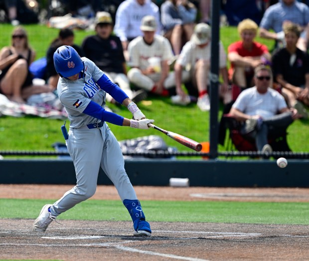 Cherry Creek's Owen Elser smacks a two-run hit against the Grandview Wolves in the second inning of their Class 5A state baseball semifinal at All-Star Park in Lakewood on Saturday, May 24, 2025. (Photo by Andy Cross/The Denver Post)