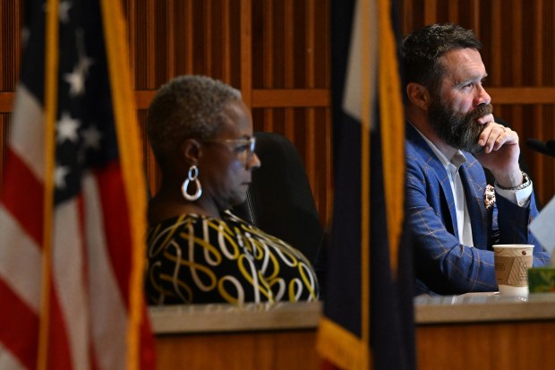 Aurora city council members Stephanie Hancock, left, and Steve Sundberg, right, listen during the weekly city council meeting inside the Aurora Municipal Center on Oct. 14, 2024. (Photo by Helen H. Richardson/The Denver Post)