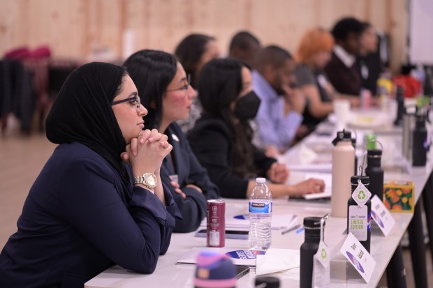 Reham Abdunabi, left, participates in a New American Leaders political training session at 2nd Home Community in Aurora on Friday, March 7, 2025. (Photo by Hyoung Chang/The Denver Post)