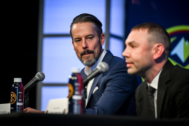 Team president Josh Kroenke listens as head coach David Adelman of the Denver Nuggets speaks during an introductory press conference at Ball Arena in Denver on Wednesday, May 28, 2025. Adelman takes over as the 23rd head coach in team history entering the 2025-26 season. (Photo by AAron Ontiveroz/The Denver Post)