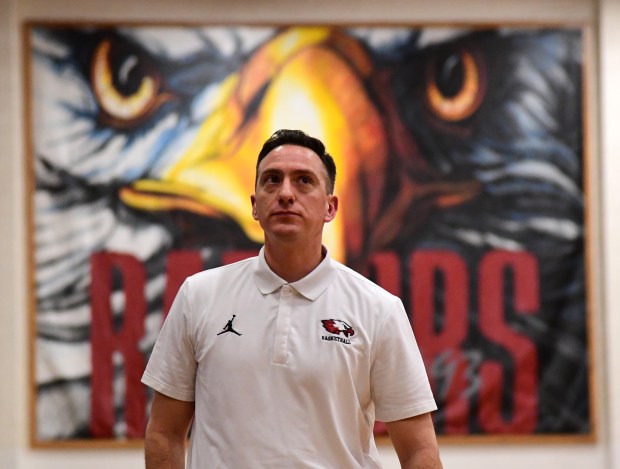 Eaglecrest head coach Jarris Krapcha is ...