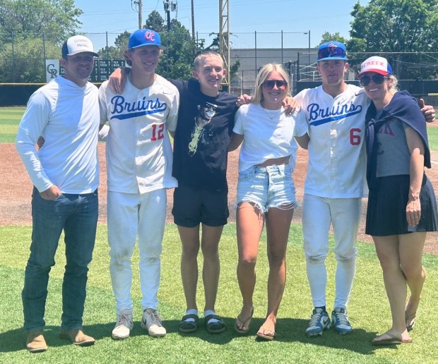 The Rudden family, from left, father Nick, kids Wyatt, Hudson, Annabelle and Walker, and mother Megan stand for a photo after Cherry Creek won their 10th state title at All-Star Park in Lakewood, Colorado, on Saturday, May 31, 2025. The win that had deeper meaning because of the family's connection to the Bags of Fun Foundation. (Photo by Troy Renck/The Denver Post)