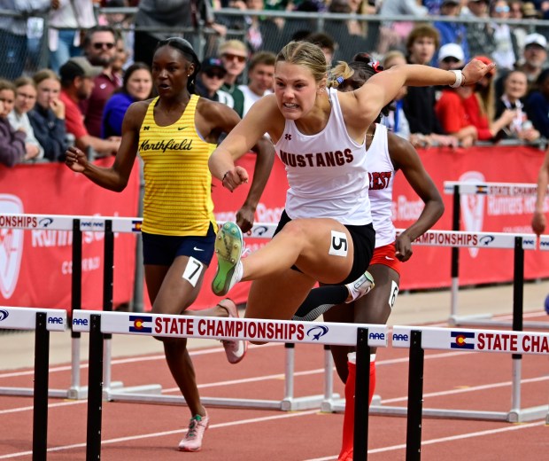 Ponderosa High School's Payton Becker clears the last hurdle to take the 5A 110-meter hurdle championship during the Track and Field State Championships at Jeffco Stadium in Lakewood, Colorado, on Saturday, May 17, 2025. (Photo by Andy Cross/The Denver Post)